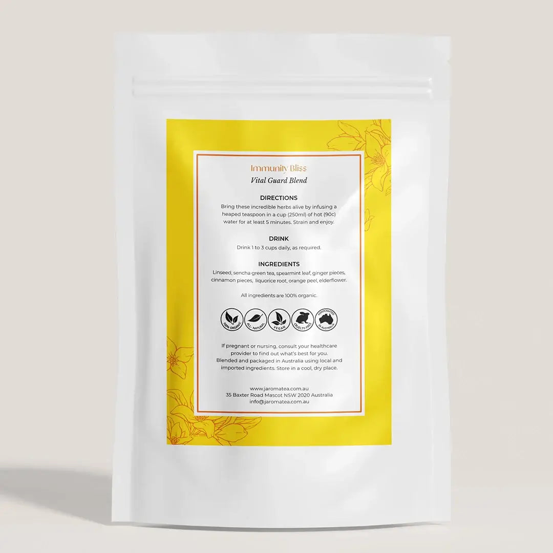 Back of the Jaroma Immunity Bliss tea pack, showing directions and ingredients like linseed, ginger, cinnamon, and elderflower, all 100% organic for vitality and wellness.