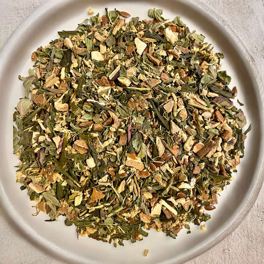 Jaroma Immunity Bliss Tea Blend, a natural herbal tea designed to support the immune system with ingredients like Sencha green tea, ginger, and elderflowers.